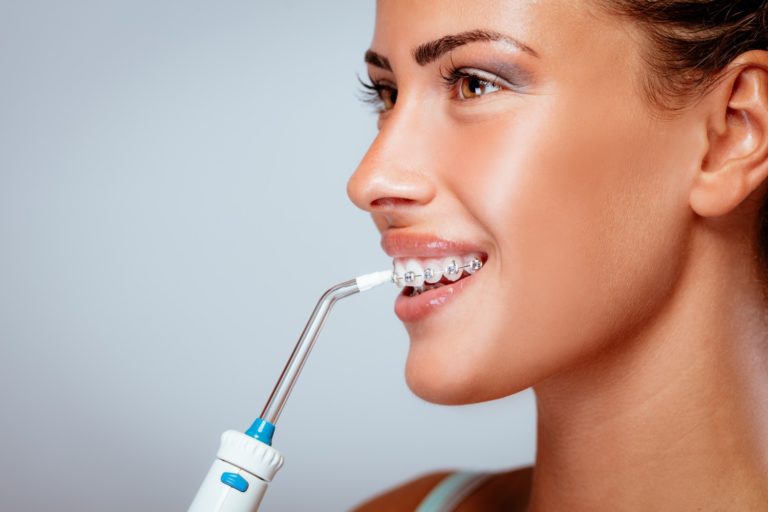 what-is-a-water-flosser-and-how-does-it-work-carrollton-orthodontics